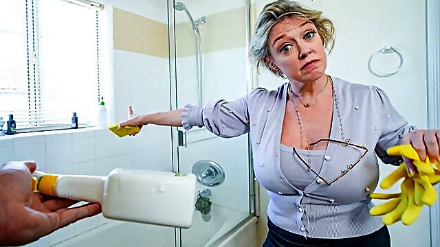 Busty mother Dee Williams is smothering him with her lust