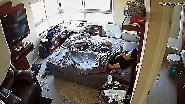 IPCAM – Fat Latina masturbates watching porn