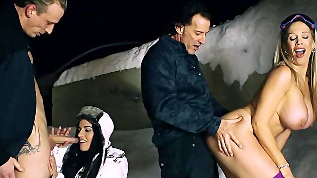Ski instructors bang a busty MILF and two petite teens