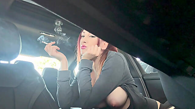 Artemisia Love Smoking a Cigarette in the Car